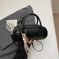 Sac polochon noir grainé avec logo argenté et pendentif de raquette de tennis doré - Noir avec pendentif