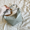 Sage green crescent underarm bag with silver chain strap and polished leather finish - Gray