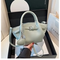 Detail of light green litchi texture bucket bag with heart charm in gift box - Blue