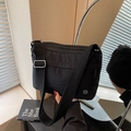 Minimalist black nylon crossbody tote bag with multi-layer zippers and wide fabric strap - Black
