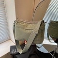 Minimalist olive green crossbody tote bag with multi-layer zipper and woven strap - Green