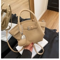 Elegant khaki pleated bucket bag in lychee texture leather with a heart charm detail - Khaki