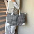 Large houndstooth canvas travel tote bag with white leather trim and handles - Black