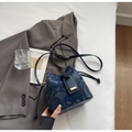 Navy blue snake-print bucket bag with smooth leather trim and golden metal clasp - Blue Without Charm
