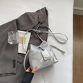 Silver bucket shoulder bag with snake skin texture and metal lock detail - Silver No Pendant