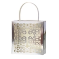 Close-up of laser-cut cross design on silver metallic wedding favor candy gift box - Reflective Silver