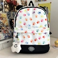Colorful paw print backpack with cute ears and plush charm on an anime-style desk - Multicolor Paw Print Style (With Charm)