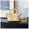 Light yellow faux leather handbag with lace bow and pearl charm in minimalist setting - With Charm / Light Yellow