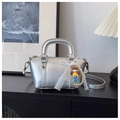Silver metallic trapezoid handbag with cute doll charm and lace bow detail - With Charm / Silver