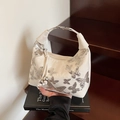 Creamy white sequined butterfly handbag with a stylish semi-circular metal handle - Off White