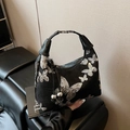 Black matte crescent bag with sparkling silver sequin butterfly and metallic tassels - Black