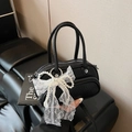 Mini black lychee leather handbag with decorative lace pearl bow and silver zipper - Black With Pendant