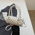 Polka dot white cylinder bag with top handles and a crossbody strap in a glossy finish - Off-white (No Pendant)