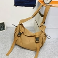 Khaki nylon dumpling crossbody bag with adjustable buckle and drawstring side pockets - Khaki