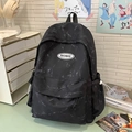 Mochila con diseño de mármol blanco y negro con varios bolsillos y logo de marca RKDBAG - Sin colgante / Negro