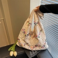 Knitted hollow tote bag in cream with colorful beads and star patterns - Off White