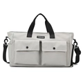 Light grey nylon travel bag with front pockets and black shoulder strap for travel - Dawn Grey