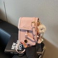 Light pink leather crossbody bag with adjustable strap and cute white fluffy charm - With Charm / Pink