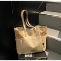 Grote beige en kaki canvas shopper met lederen logo-patch en handige zijvakken - Khaki