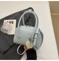 Light blue faux leather satchel bag with pearl heart charm and adjustable shoulder strap - With Charm / Light Blue