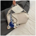 Beige litchi grain pillow bag with blue elephant pendant and heart charm strap - With Elephant Pendant / White