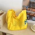 Grand sac cabas en toile jaune vif avec inscription bleue pour le quotidien - Jaune