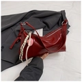 Deep red shoulder bag detail with silver zipper and woven heart charm accessory - With Pendant / Red