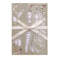 Detail of glitter gold laser cut wedding invitation with cream ribbon bow and floral pattern - Light Gold Glitter