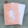 Detailed laser-cut floral and butterfly patterns on pink invitation card with white insert - Light Pink