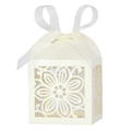 Detail of laser-cut hibiscus flower pattern on elegant wedding favor box with ribbon bow - Ivory