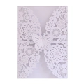 White laser cut floral wedding invitation cover with a 3D butterfly closure detail - White