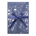 Detail of laser-cut lace wedding invitation with elegant ribbon and floral carriage design - Magic Blue