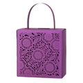 Macro shot of purple laser-cut candy box with hollow floral patterns and handle - Dark Purple