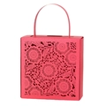 Detail of red laser-cut candy box featuring intricate floral hollow patterns and handle - Pearlescent Red