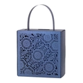 Detail of laser-cut floral patterns on dark blue gift box with handles for weddings - Magic Blue