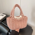 Borsa a secchiello rosa intrecciata a mano con fodera bianca a coulisse per stile versatile - Rosa