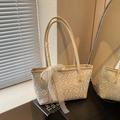 Elegante borsa a secchiello in jacquard crema con motivi floreali e nastro in pizzo - Bianco Sporco