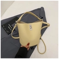 Elegant beige bucket bag with litchi texture and silver metal twist lock closure - Yellow Without Pendant