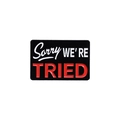 Rectangular black enamel pin with white and red lettering SORRY WE'RE TRIED - Qhxz2036