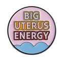 Pink enamel pin featuring the text BIG UTERUS ENERGY with blue waves decoration - Round Slogan Style (QHXZ4433)
