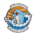 Enamel dolphin badge featuring pink sunglasses and Fin-tastic Chillin' Vibes text - Sunset Dolphin Style (QHXZ4983)