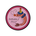 Round pink enamel pin featuring a cartoon shrimp with Shrimply Silly text - Party Hat Style (QHXZ5219)