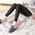 Slim fit black leggings with micro-shimmer effect and stirrup design for women - M / Cropped Pants / Black