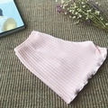 Pink rib-knit safety shorts with elastic waist displayed on a textured woven mat - M / Pink
