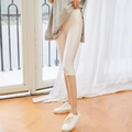 Glossy high-waisted cycling shorts in creamy white with a premium satin finish - L / Capri Pants / White