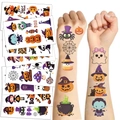 Tatuaggi temporanei di Halloween per bambini con zucche e fantasmi applicati sul braccio - Serie di Halloween