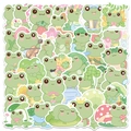 Set di 50 adesivi a forma di rana cartoon per decorare laptop e chitarre in verde - Mix di Rane Vibranti