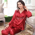 Luxury red satin pajama set with long sleeves and delicate lace details for women - M / Burgundy