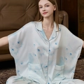 Women's light blue floral silk pajama set featuring wide batwing sleeves and long pants - M / Light Blue Floral