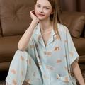 Women's light blue silk pajama set with geometric patterns and short sleeve top - M / Geometric Triangle